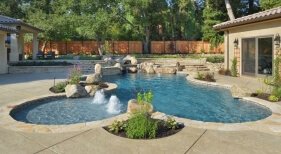 Freeform Pool and Spa with Tanning Ledge and Bubblers
